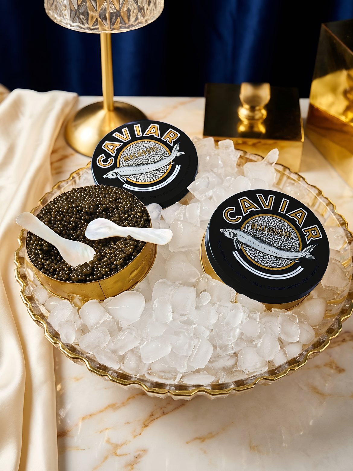 Caviar tins on ice in a gold-rimmed crystal bowl at a One Sushi caviar bar
