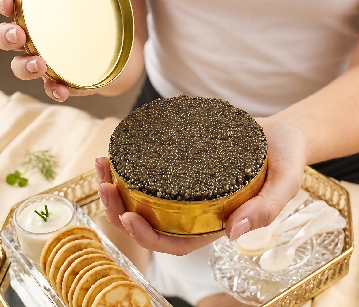 Caviar tin, blinis and crème fraîche served at a One Sushi caviar bar