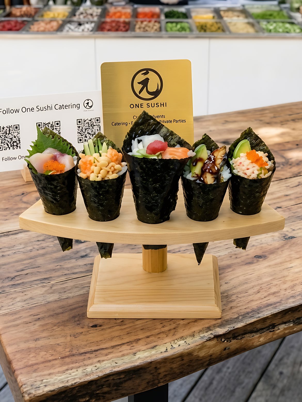 Hand roll cones on a stand in front of a One Sushi hand roll station