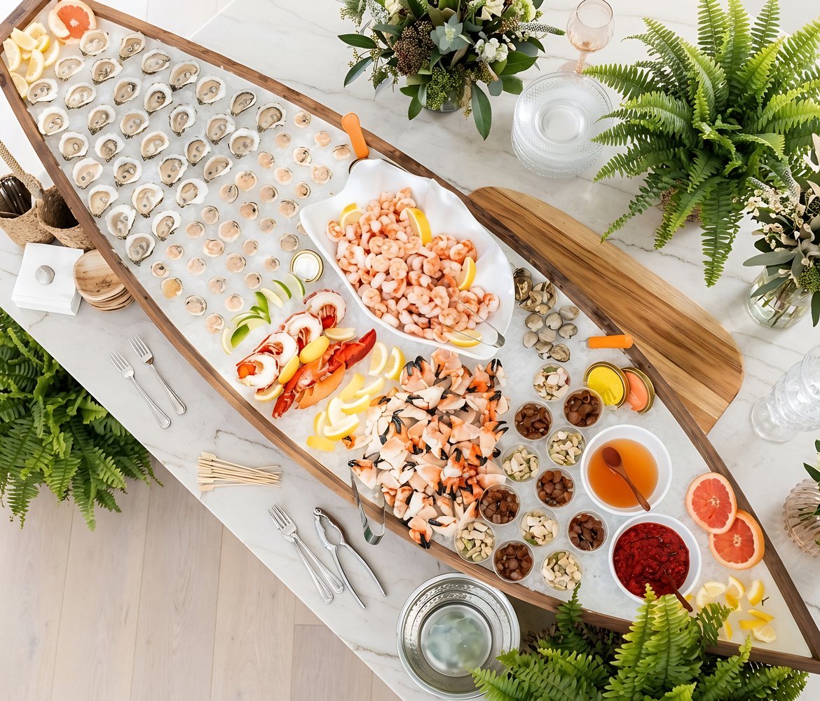 Overhead view of a seafood boat with oysters, shrimp, crab claws and lobster